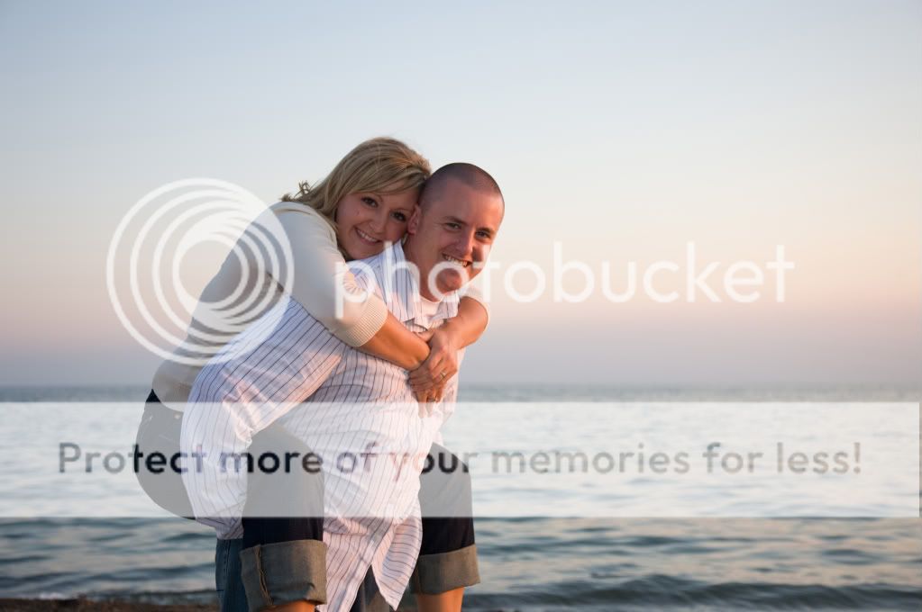 IMAGE: http://i458.photobucket.com/albums/qq309/jlrichmond76/154_WarrenEckhoff_Engagements.jpg